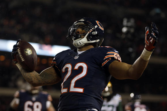 chi-matt-forte-henry-melton-bears-20140314-001