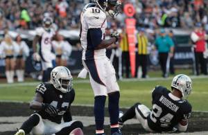 Broncos Raiders Footba(9)